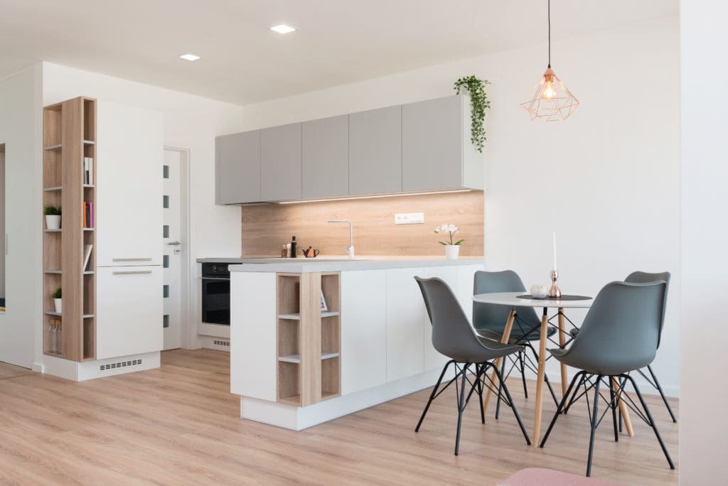 Interior of modern kitchen with built-in appliances